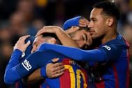 BARCELONA, SPAIN - DECEMBER 18:  Luis Suarez (C) of FC Barcelona celebrates with his team mates Lionel Messi (L) and Neymar Jr.after scoring his team's second goal during the La Liga match between FC Barcelona and RCD Espanyol at the Camp Nou stadium on December 18, 2016 in Barcelona, Spain.  (Photo by David Ramos/Getty Images)